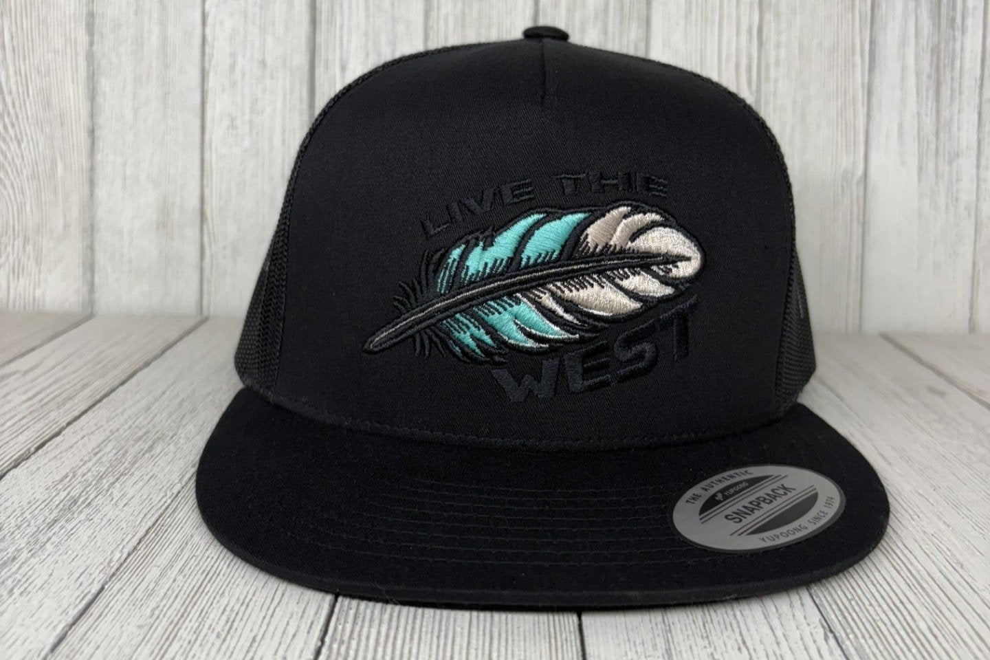 LIVE THE WEST - Black flat bill trucker hat